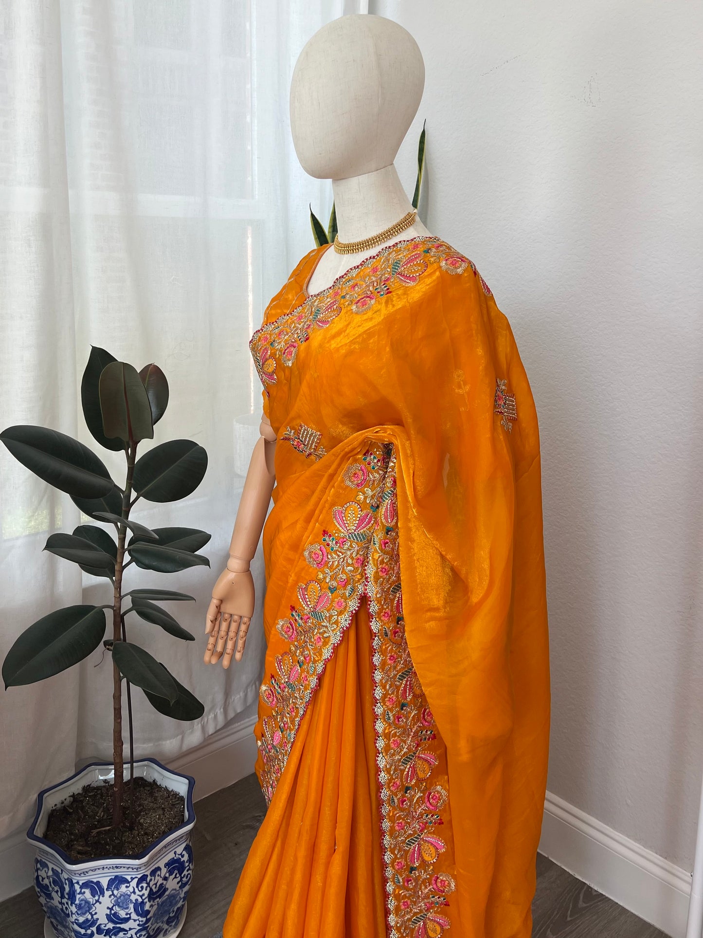 Golden yellow silk saree and Blouse with threadwork flowers and stone work