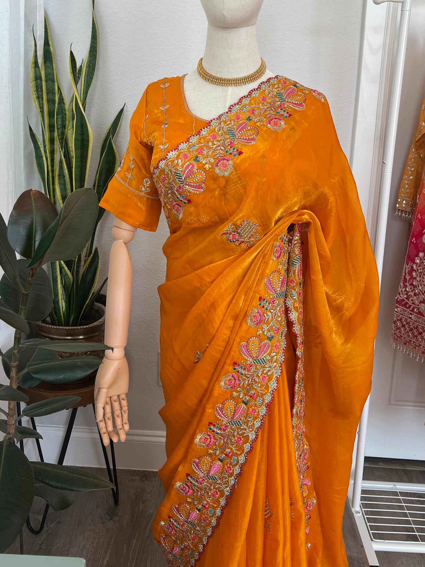 Golden yellow silk saree and Blouse with threadwork flowers and stone work