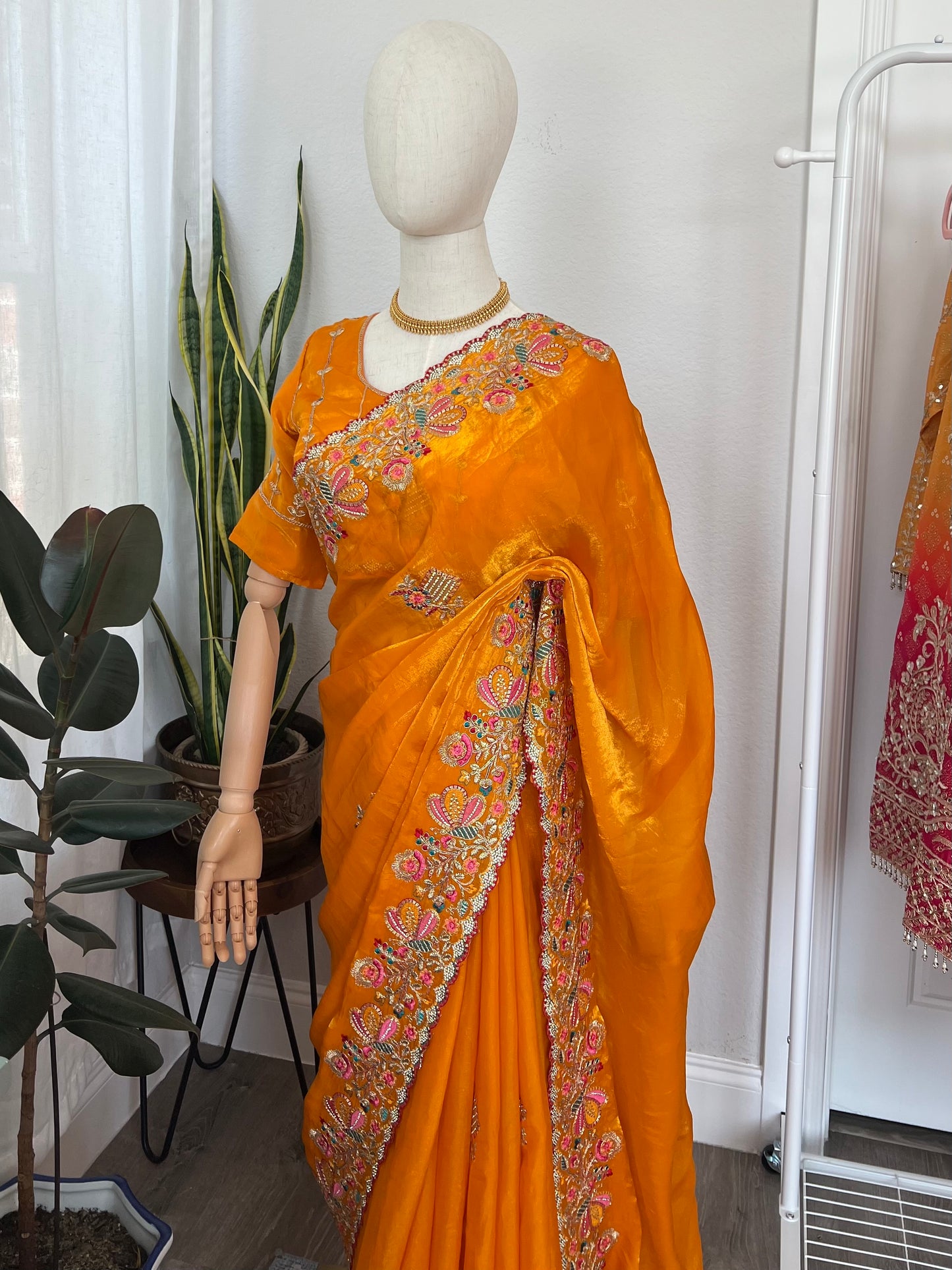 Golden yellow silk saree and Blouse with threadwork flowers and stone work