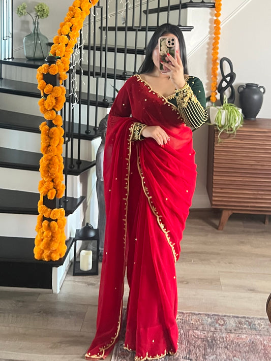 Boutique work red saree with green blouse