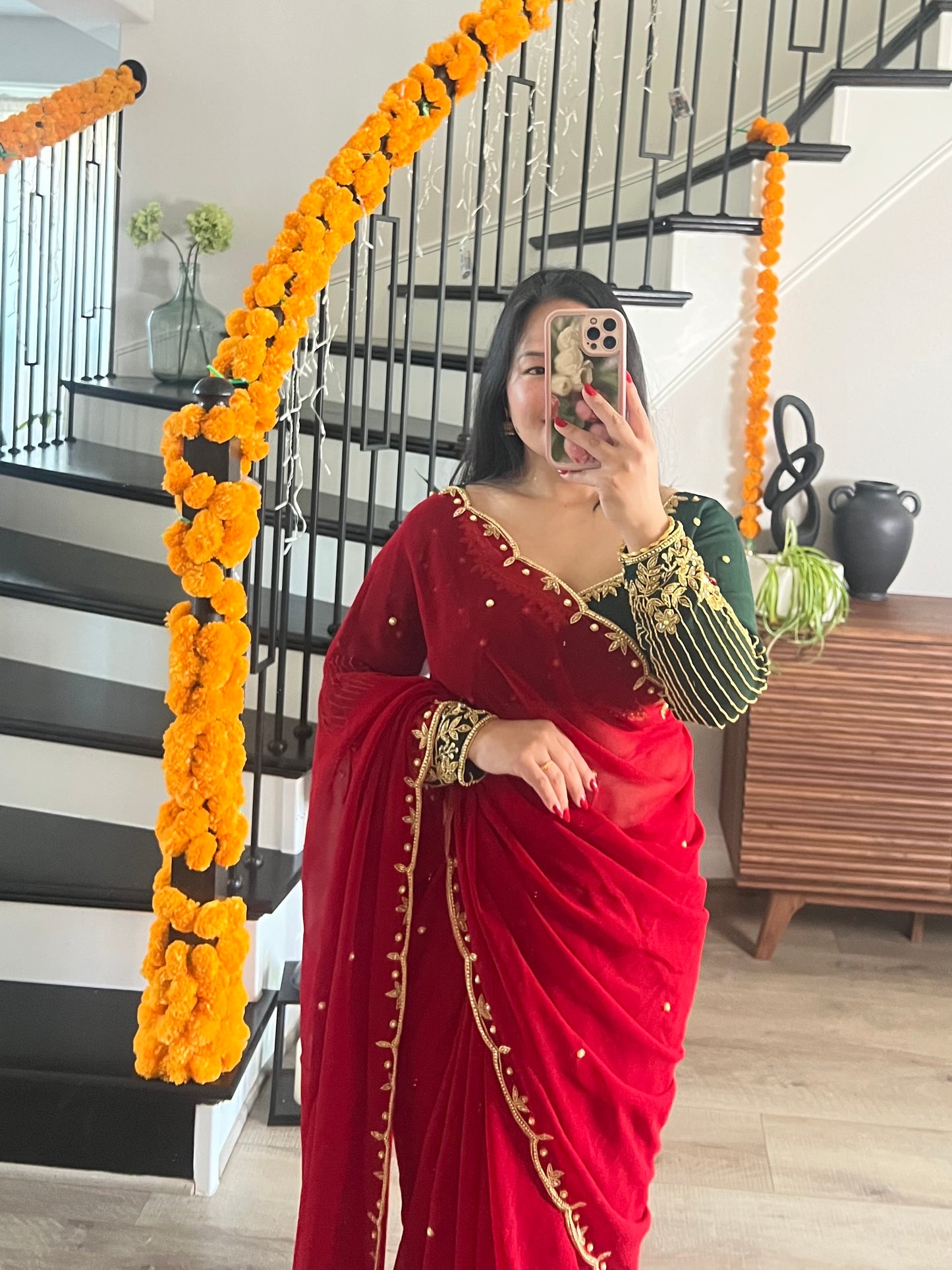 Boutique work red saree with green blouse
