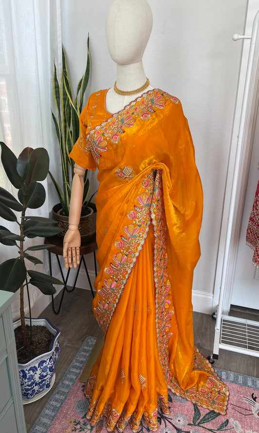 Golden yellow silk saree and Blouse with threadwork flowers and stone work